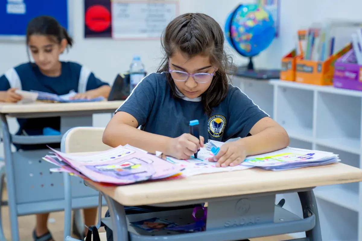 AIS student working during a classroom lesson