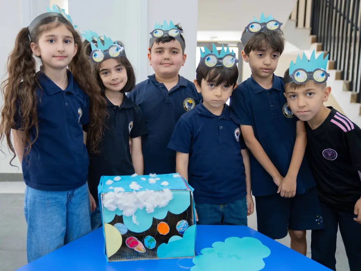 AIS students presenting projects at the science fair